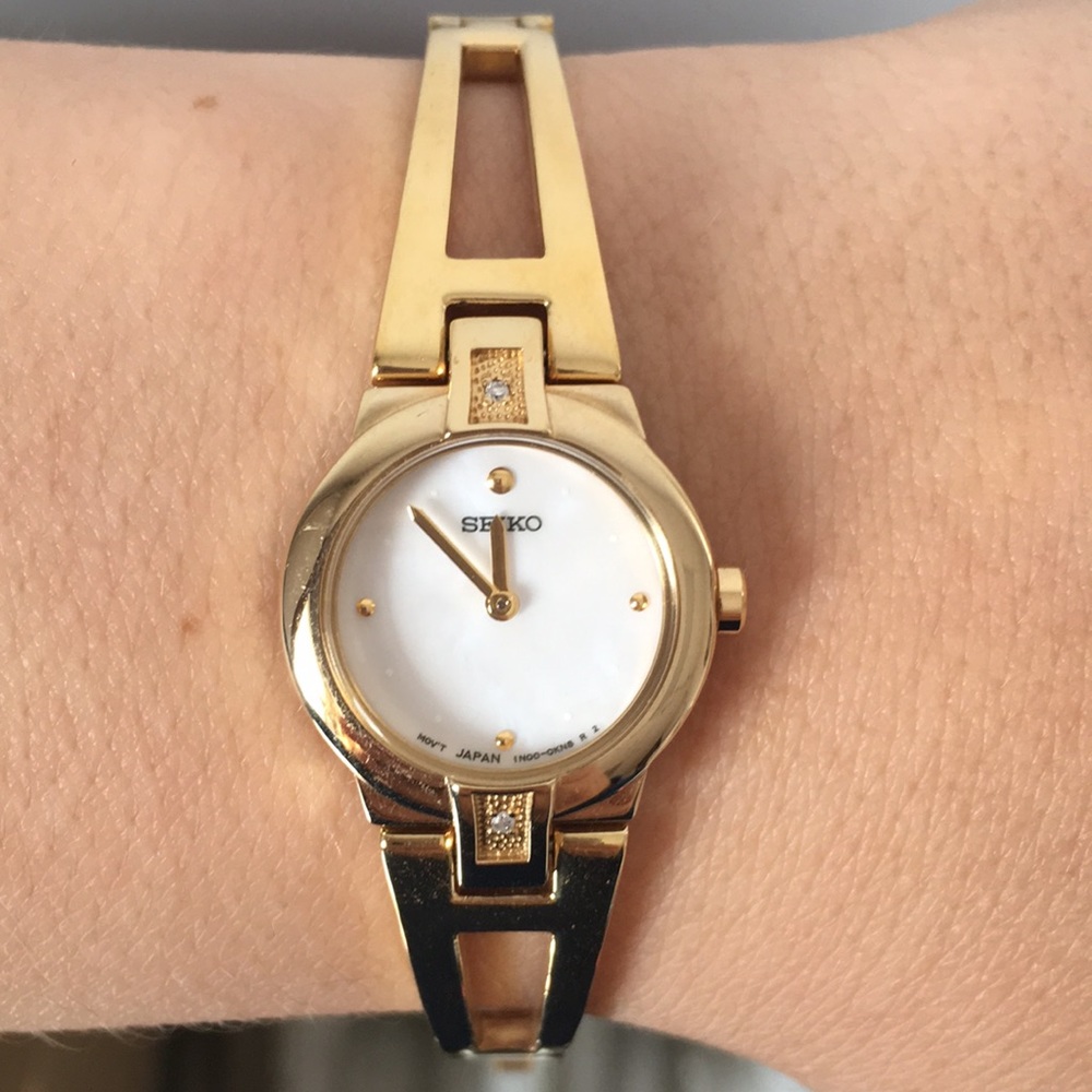 Seiko gold tone mother of pearl diamond watch